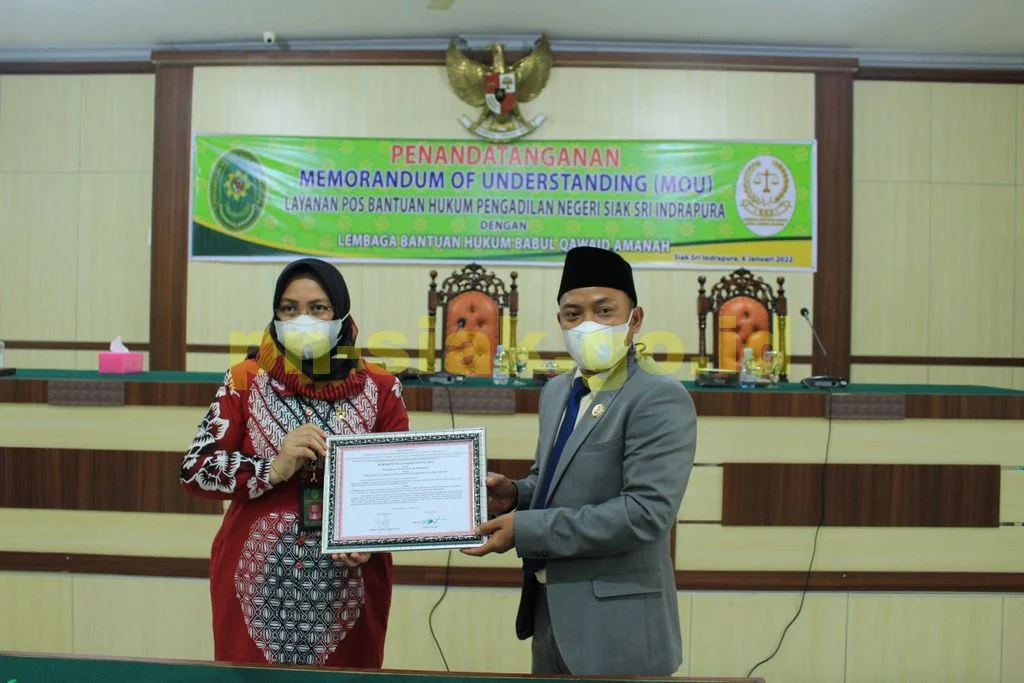 PENANDATANGANAN MEMORANDUM OF UNDERSTANDING (MOU) Layanan Pos Bantuan Hukum Pengadilan Negeri Siak Sri Indrapura
